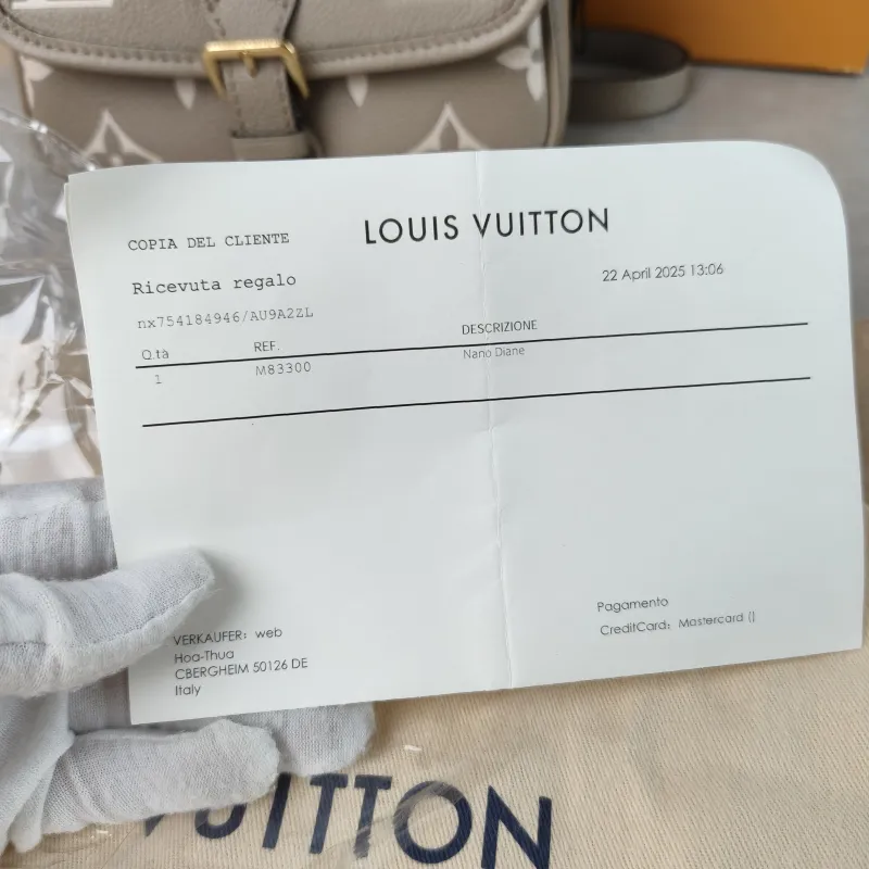 Louis Vuitton Crossbody Bag Diane Baguette Bag Empreinte Embossed Calfskin nano 19 × 6 × 10.5 cm — detail view 5 of 14