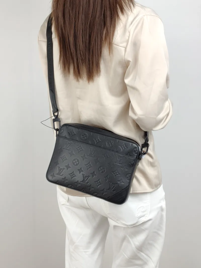 Louis Vuitton Shoulder Bag Duo Messenger Messenger Bag Black Calfskin 26 × 4.5 × 18.5 cm — on-model view 1 of 2