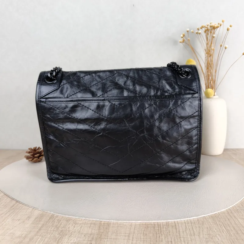 SAINT LAURENT Crossbody Bag Niki Black Waxed Leather Calfskin Medium 28 × 8.5 × 20 cm — cover view 5 of 5