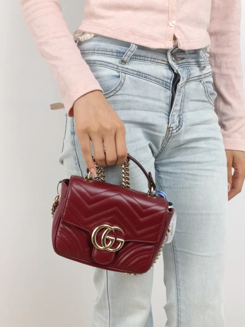 GUCCI Crossbody Bag GG Marmont Marmont Edition Calfskin Mini 17 × 6 × 13 cm — on-model view 2 of 2