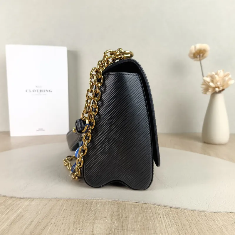 Louis Vuitton Crossbody Bag Twist Black Epi Embossed Calfskin Medium 23 × 9.5 × 17 cm — detail view 3 of 12