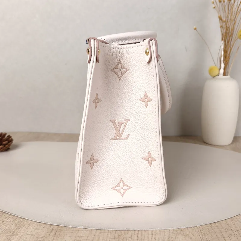 Louis Vuitton Shoulder Bag Onthego Beige · Pink Empreinte Embossed Calfskin Small25 × 11.5 × 19 cm — detail view 1 of 13