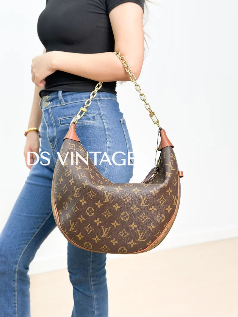 Louis Vuitton Crossbody Bag Loop Hobo Monogram PVC One Size38 × 10 × 26 cm — on-model view 3 of 3