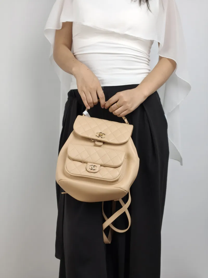Chanel Backpack Duma Taupe Calfskin Large 21 × 13 × 23 cm — on-model view 1 of 3