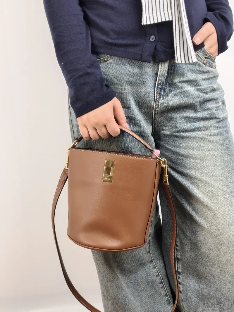 CELINE Crossbody Bag Teen Bucket 16 Bucket Bag Caramel Calfskin Small 16 × 16 × 18 cm — on-model view 1 of 3