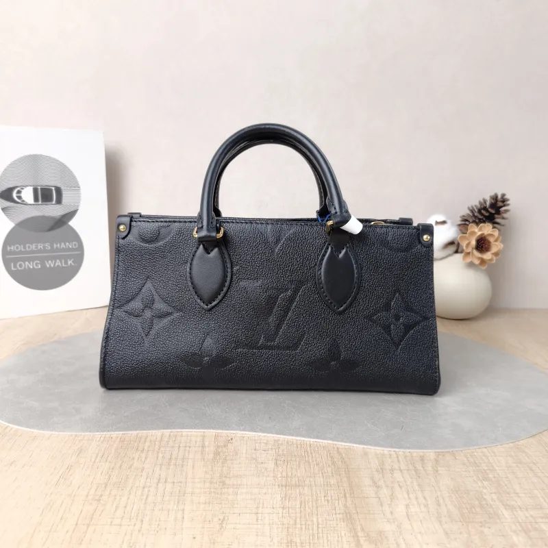 Louis Vuitton Crossbody Bag Onthego East West Two Straps Black Monogram Empreinte Embossed Calfskin Small 25 × 10 × 13 cm
