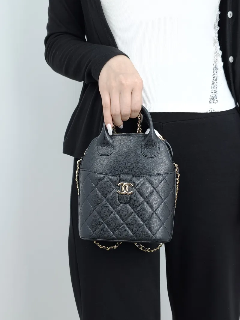 Chanel Top Handle Bag25a Edition Top Handle Bag Black Grained Calfskin One Size15.5 × 6.5 × 8.5 cm — on-model view 1 of 3
