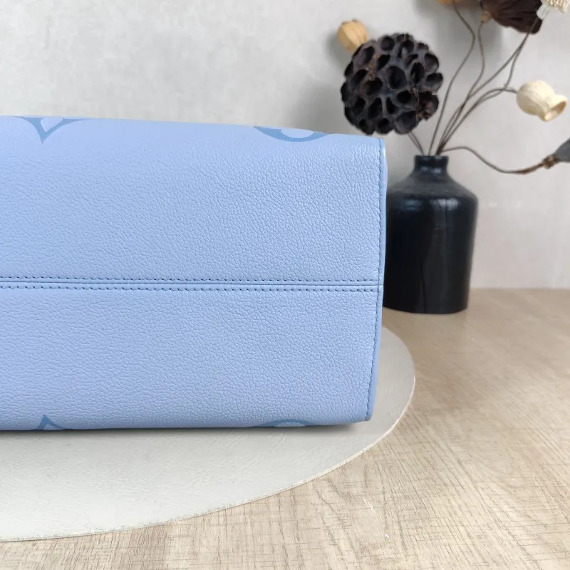 Louis Vuitton Shoulder Bag Onthego Medium Blue Monogram Empreinte Embossed Calfskin Medium35 × 14 × 27 cm — detail view 10 of 12