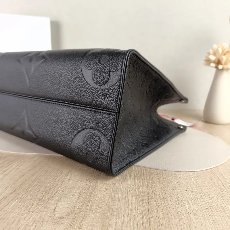 Louis Vuitton Shoulder Bag Onthego Medium Black Monogram Empreinte Embossed Calfskin Medium 35 × 14 × 27 cm — detail view 8 of 10