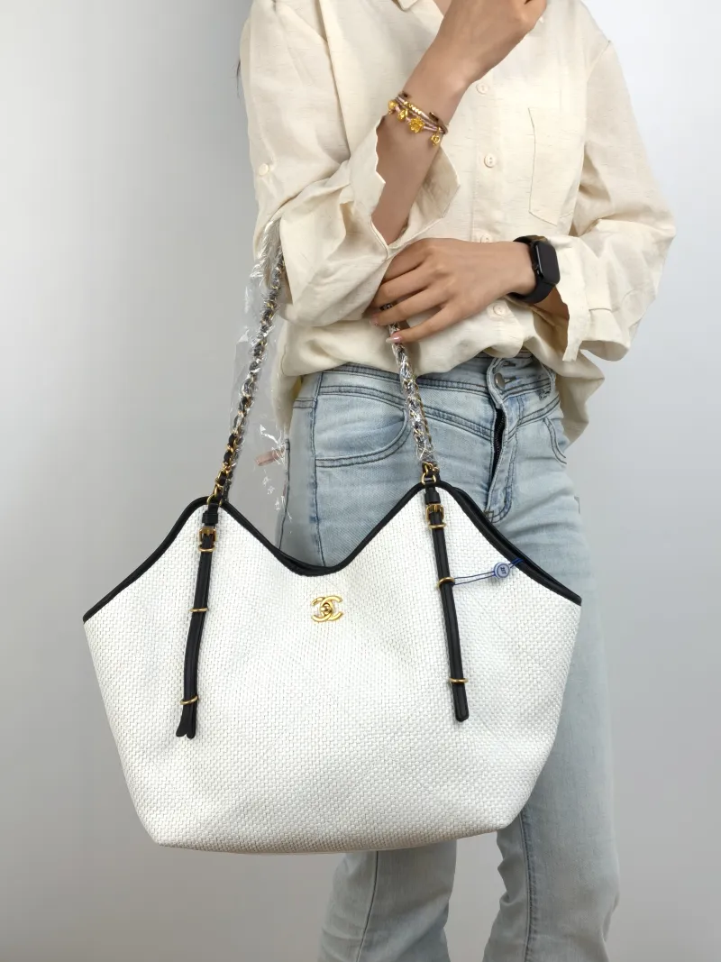 Chanel Shoulder Bag Tote Bag Woven One Size 30 × 13 × 31 cm — on-model view 1 of 2