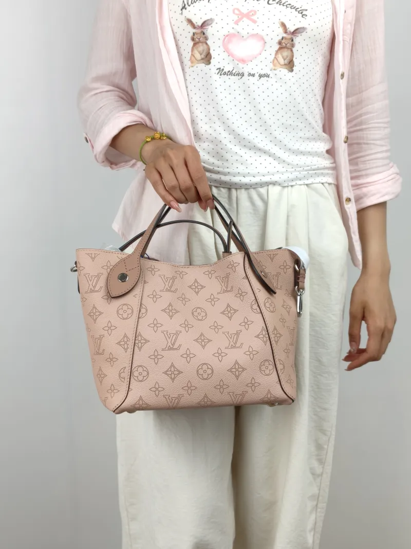 Louis Vuitton Shoulder Bag Hina Pink Calfskin Small 23 × 13 × 21 cm — on-model view 1 of 3