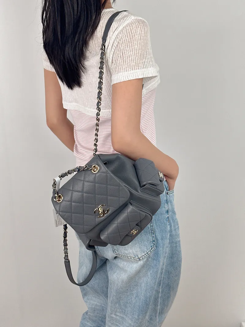 Chanel Backpackduma Grey Grained Calfskin Large21 × 13 × 23 cm — on-model view 2 of 3