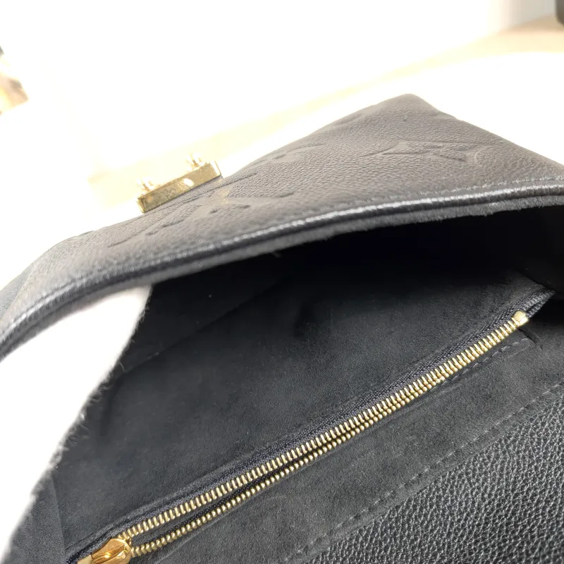 Louis Vuitton Crossbody Bag MADELEINE Black Empreinte Embossed Calfskin BB 24 × 8.5 × 17 cm — detail view 4 of 15