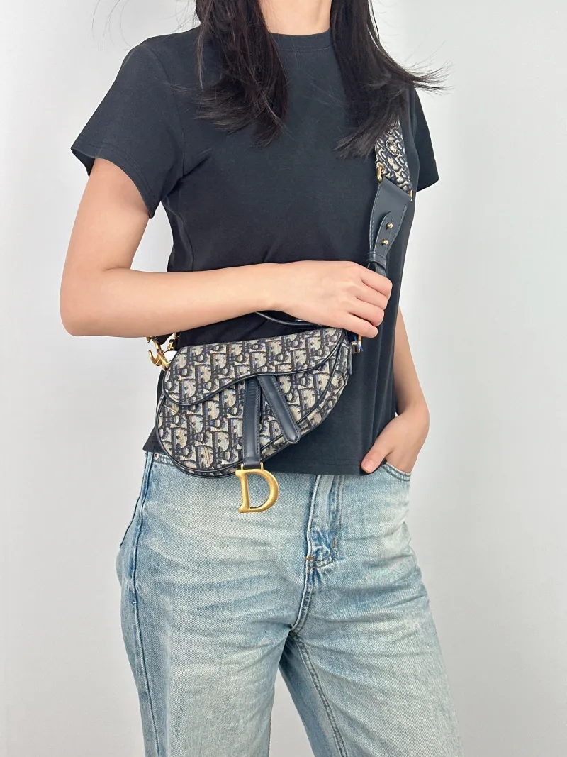 DIOR Top Handle Bag Saddle Blue Canvas Mini 19 × 6 × 15 cm — on-model view 2 of 3