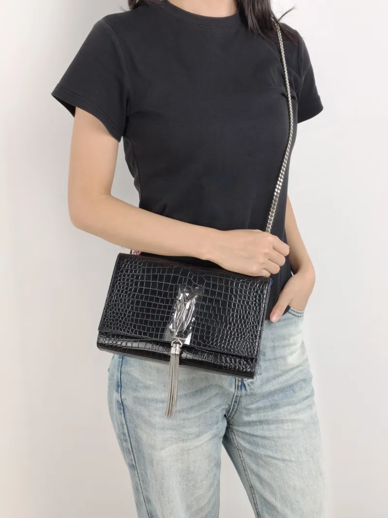SAINT LAURENT Crossbody Bag KATE Edition Black Calfskin Medium 24 × 5.5 × 14.5 cm — on-model view 2 of 2