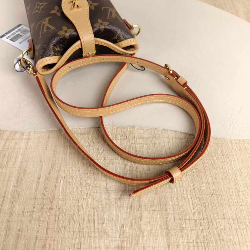 Louis Vuitton Crossbody Bag Fold Me Monogram PVC Mini 14.5 × 6.5 × 18 cm — detail view 8 of 10