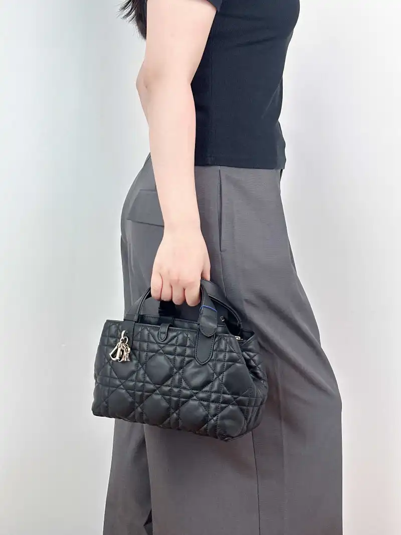 DIOR Top Handle Bag TOUJOURS Black Calfskin Small23 × 12 × 15.5 cm — on-model view 2 of 2