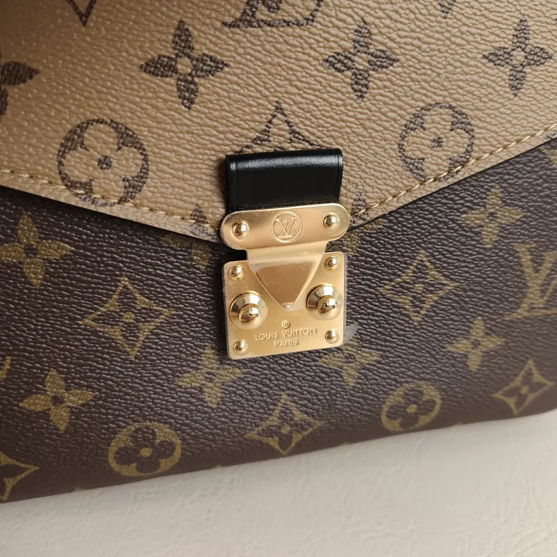 Louis Vuitton Crossbody Bag Pochette Métis Monogram Colorblock PVC Medium 25 × 7 × 19 cm — detail view 13 of 14
