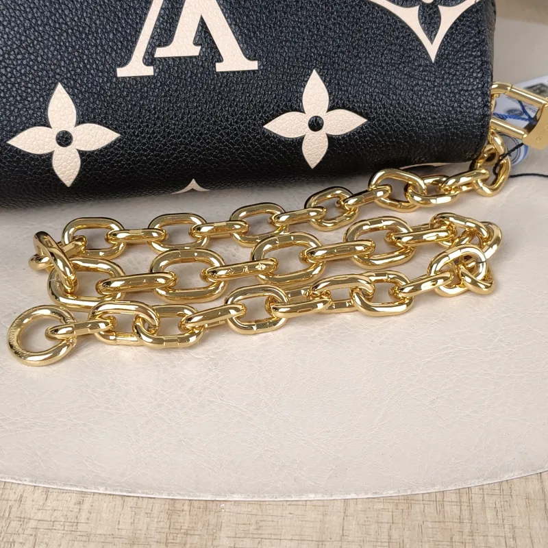 Louis Vuitton Crossbody Bag Favorite Black · White Empreinte Embossed Calfskin Medium 24 × 9 × 14 cm — detail view 8 of 12