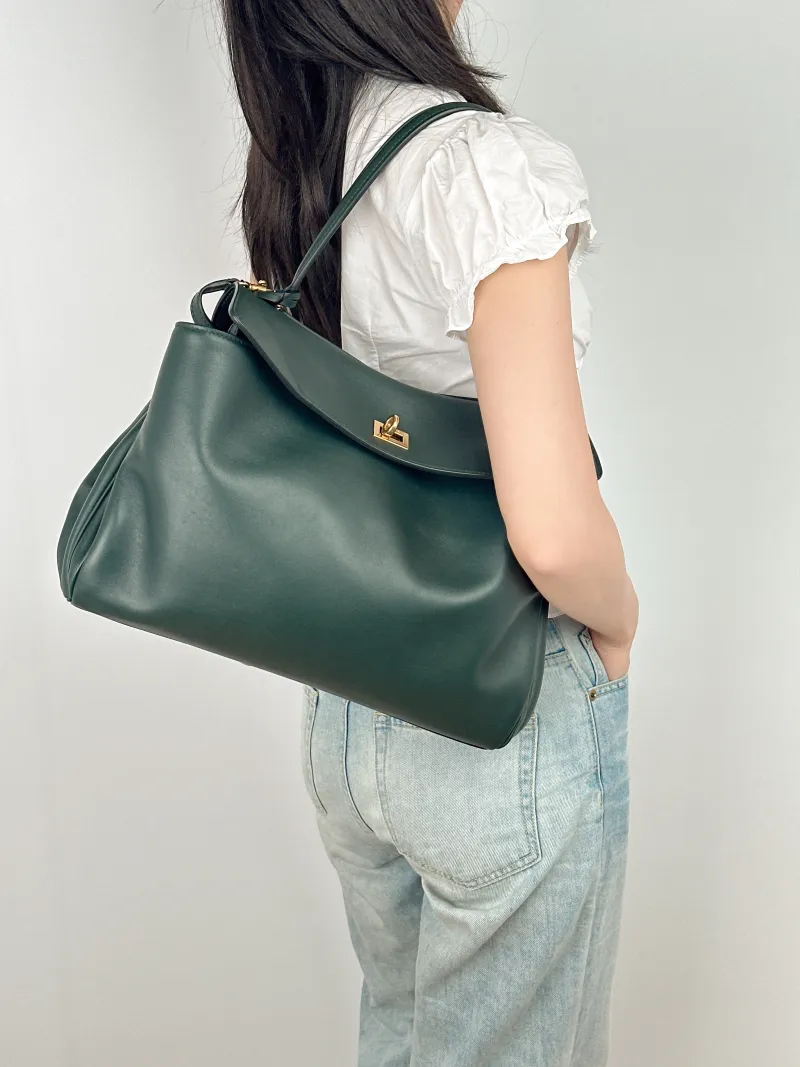 BALENCIAGA Crossbody Bag RODEO Green Calfskin Medium35 × 11 × 23.5 cm — on-model view 2 of 2