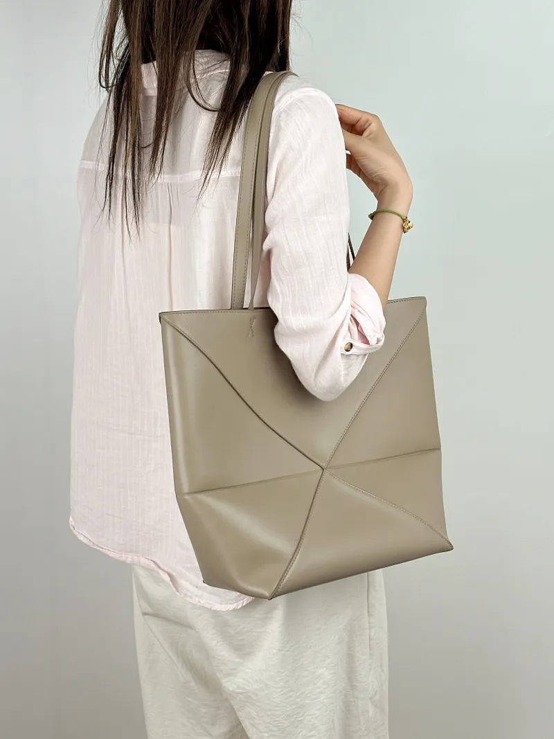 LOEWE Shoulder Bag Puzzle Fold Shopping Tote Grey Calfskin Medium 25.5 × 14.5 × 31.5 cm — on-model view 1 of 2