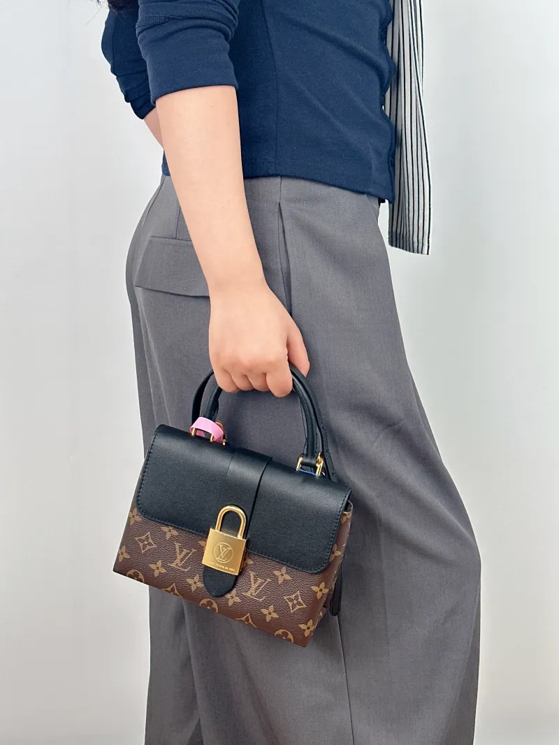 Louis Vuitton Crossbody Bag Locky BB Black PVC BB 20 × 7.5 × 16 cm — on-model view 2 of 2