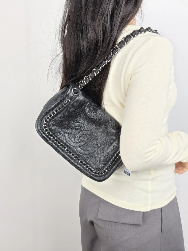 Chanel Shoulder Bag Black Calfskin 24 × 6 × 14 cm 10 Conditioned — on-model view 1 of 2
