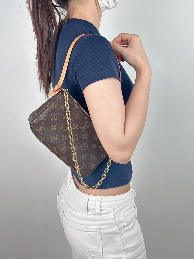 Louis Vuitton Shoulder Bag Pochette Accessoires Monogram PVC Large 23 × 4 × 13.5 cm — on-model view 1 of 2