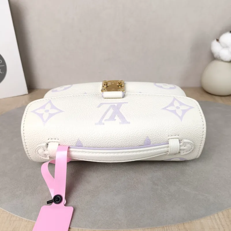 Louis Vuitton Crossbody Bag Pochette Métis East West White · Monogram Empreinte Embossed Calfskin Small 21.5 × 6 × 13.5 cm — detail view 14 of 14