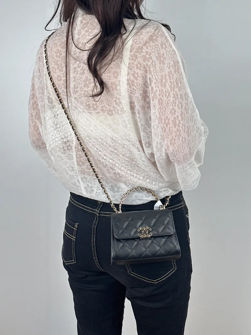 Chanel Crossbody Bag kelly Black Grained Calfskin nano 15 × 5 × 11 cm — on-model view 2 of 2