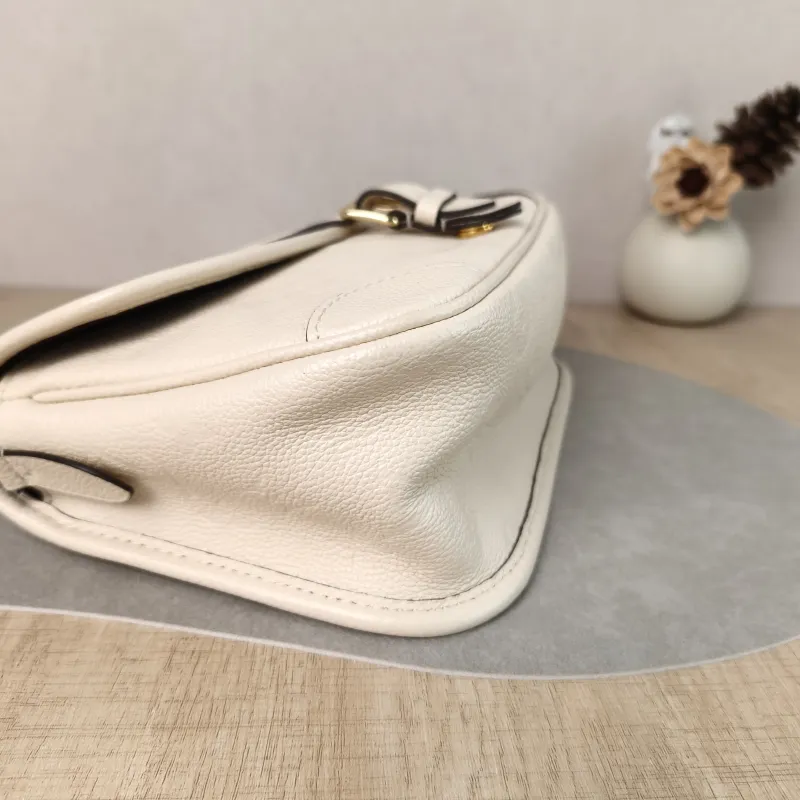 Louis Vuitton Crossbody Bag Diane Baguette Bag White Monogram Empreinte Embossed Calfskin Small 24 × 9 × 15 cm — detail view 9 of 11
