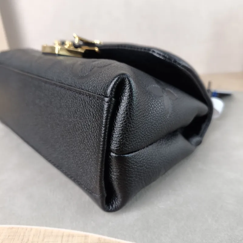 Louis Vuitton Crossbody Bag MADELEINE Black Empreinte Embossed Calfskin BB 24 × 8.5 × 17 cm — detail view 7 of 12