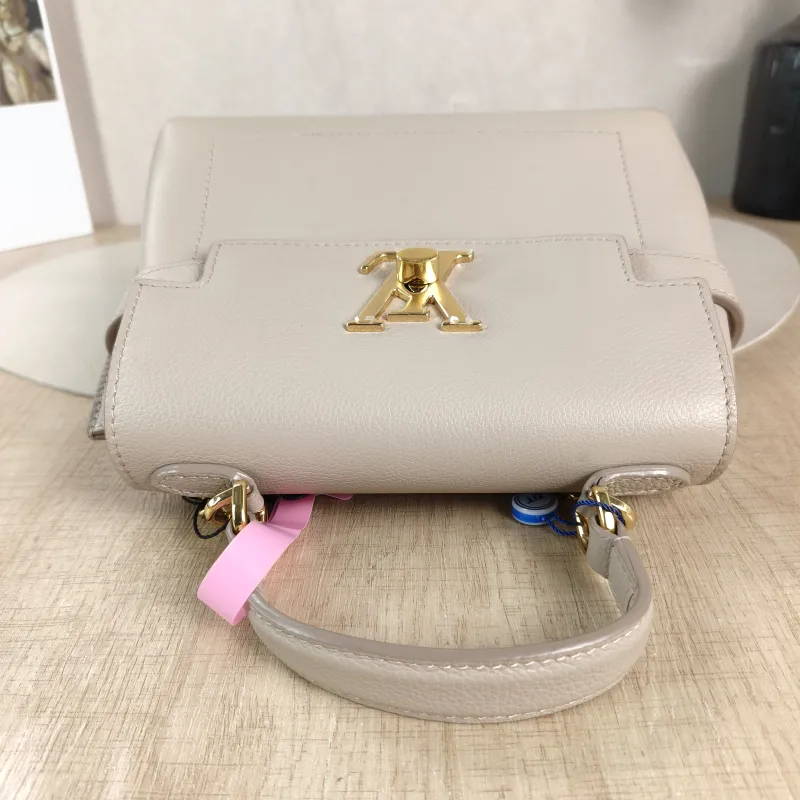 Louis Vuitton Crossbody Bag Lockme Ever Top Handle Bag Calfskin Mini 23 × 10 × 17 cm — detail view 8 of 13
