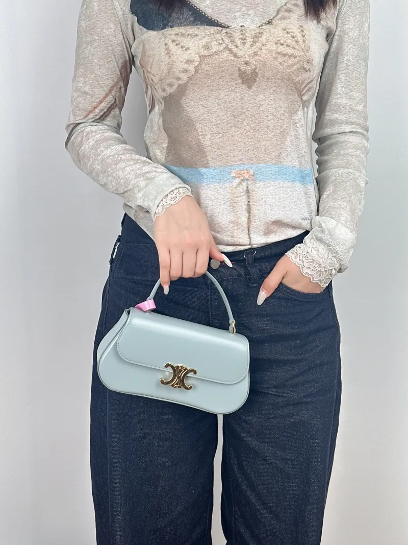 CELINE Crossbody Bagteen lola Crossbody Bag Blue Calfskin20 × 8.5 × 11.5 cm — on-model view 1 of 3