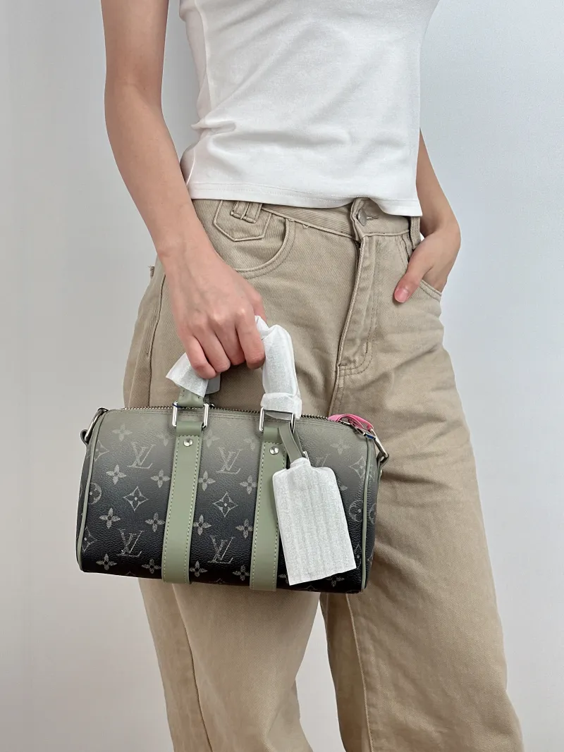 Louis Vuitton Crossbody Bag Keepall 25 PVC Medium 25 × 11 × 15 cm — on-model view 1 of 3