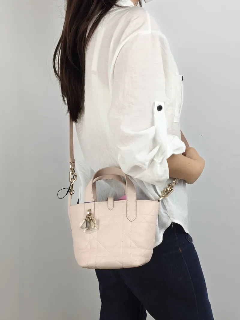 DIOR Top Handle Bag TOUJOURS Edition Pink Calfskin Mini 13 × 12 × 15 cm — on-model view 1 of 2