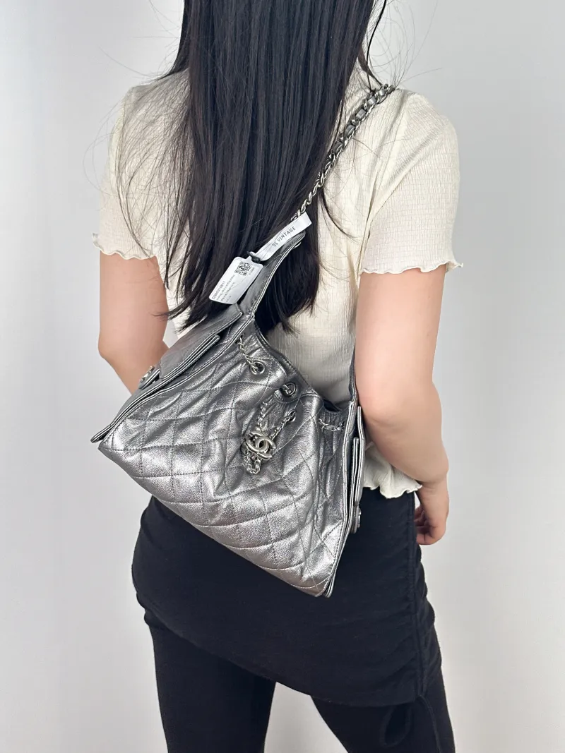 Chanel Shoulder Bag25Bag Silver Calfskin Small26 × 14 × 30 cm — on-model view 2 of 2