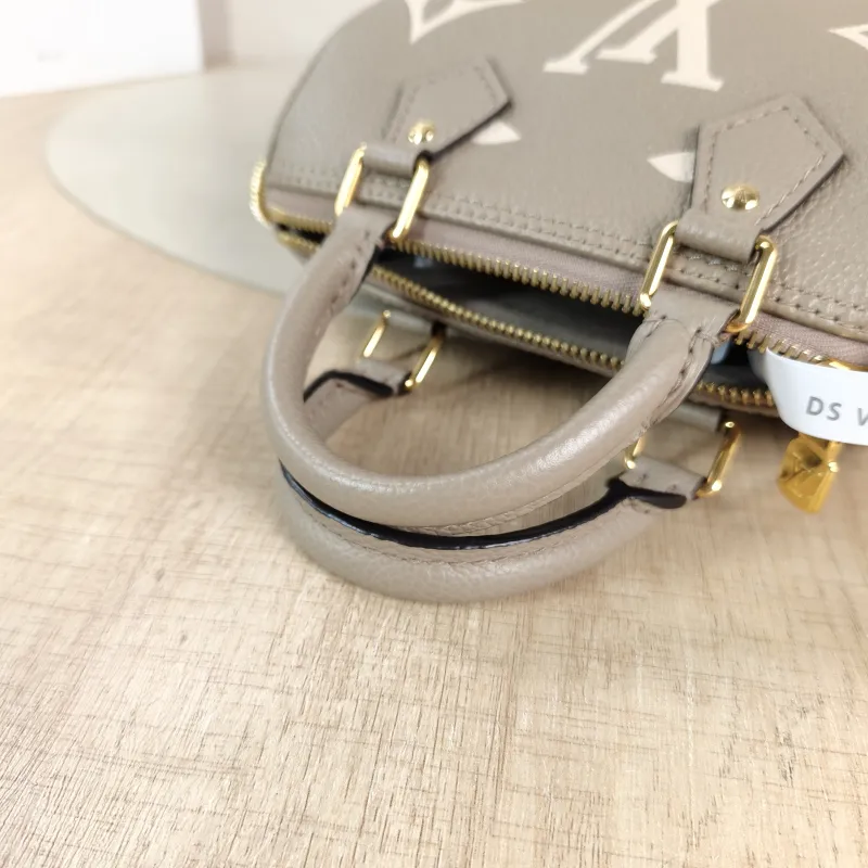 Louis Vuitton Crossbody Bag Speedy Nano · White Monogram Empreinte Embossed Calfskin nano 16 × 7.5 × 10 cm — detail view 8 of 11