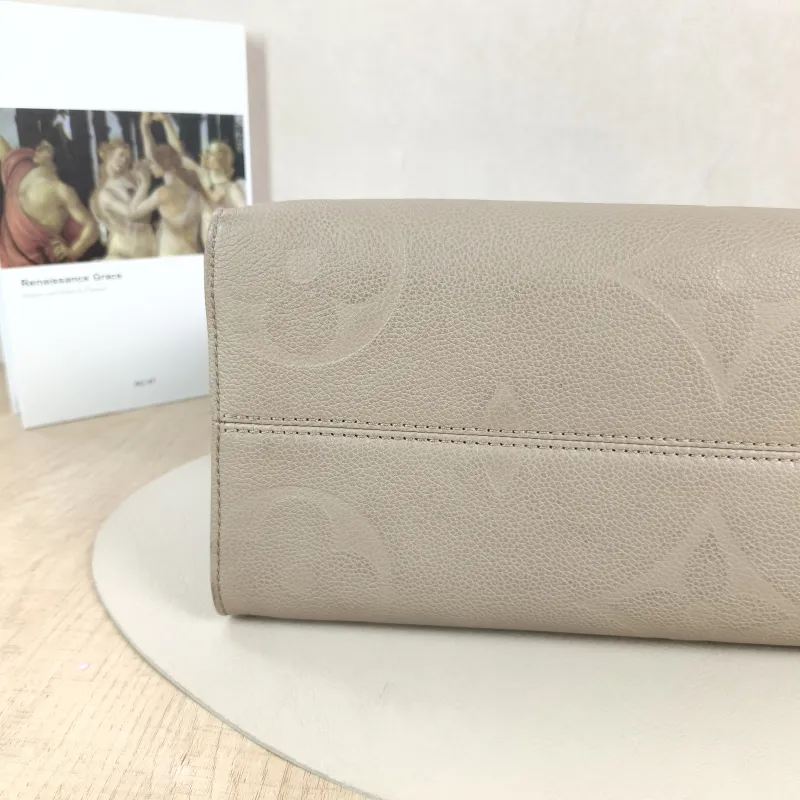 Louis Vuitton Shoulder Bag Onthego Medium Monogram Empreinte Embossed Calfskin Medium 35 × 14 × 27 cm — detail view 2 of 11