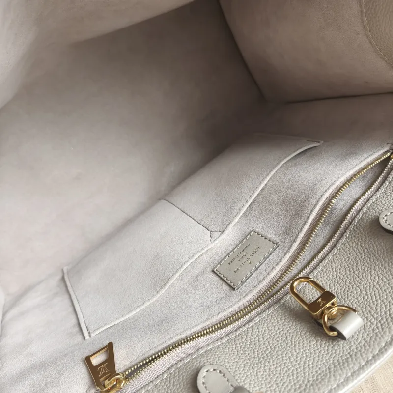 Louis Vuitton Shoulder Bag Onthego Medium Monogram Empreinte Embossed Calfskin Medium 35 × 14 × 27 cm — detail view 1 of 11