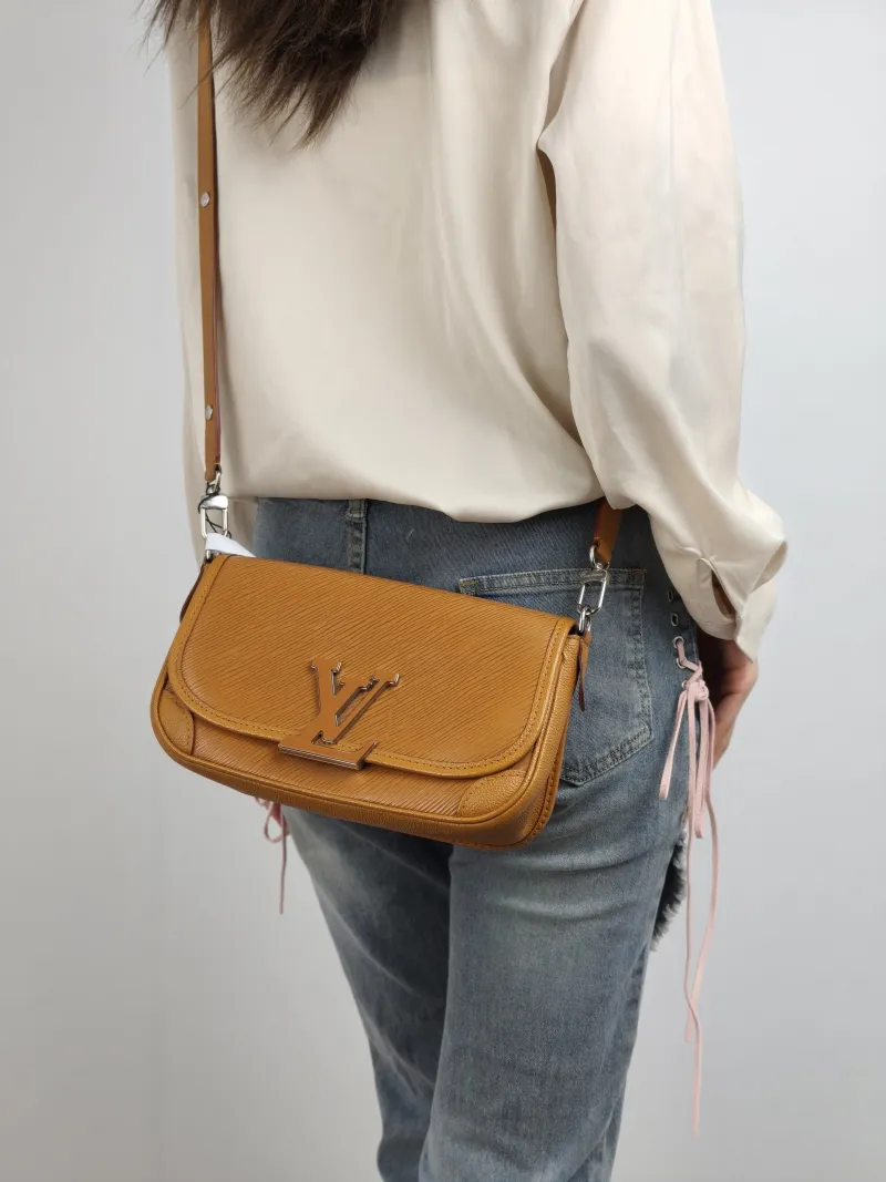 Louis Vuitton Shoulder Bag BUCI Epi Embossed Calfskin 24.5 × 9 × 15.5 cm — on-model view 2 of 2