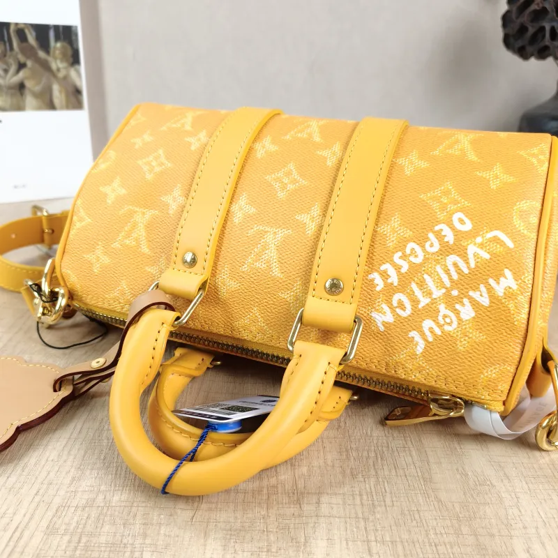 Louis Vuitton Crossbody Bag Keepall 25 Collection Yellow PVC Medium 25 × 11 × 15 cm — detail view 12 of 12