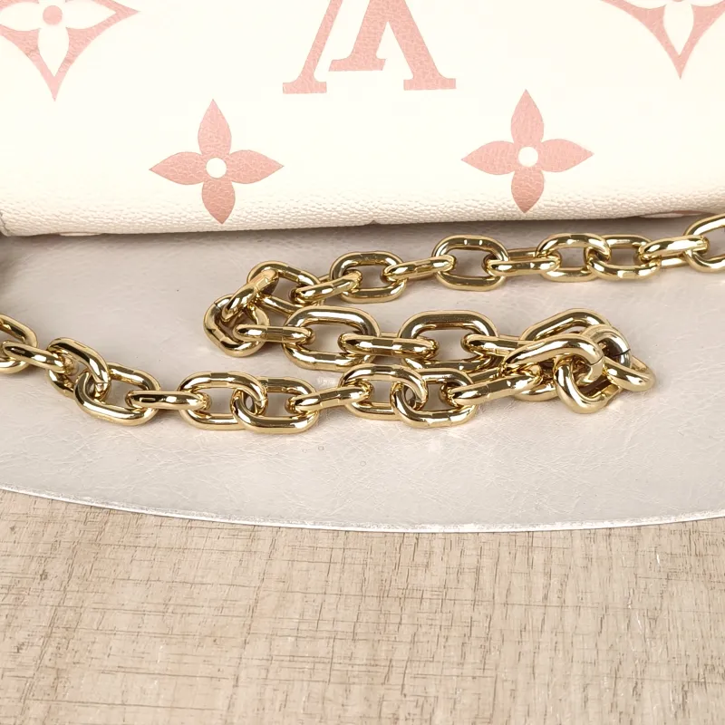 Louis Vuitton Crossbody Bag Favorite White · Pink Empreinte Embossed Calfskin Monogram Medium24 × 9 × 14 cm — detail view 9 of 14