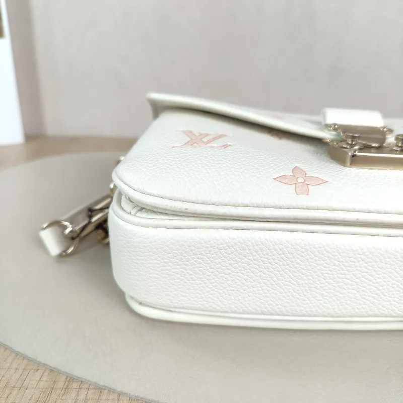 Louis Vuitton Crossbody Bag Pochette Métis East West White · Pink Monogram Empreinte Embossed Calfskin Small21.5 × 6 × 13.5 cm — detail view 10 of 13