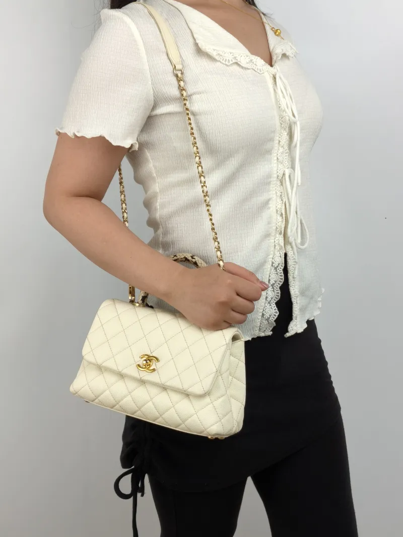 Chanel Top Handle Bag Coco Handle​ Beige Grained Calfskin Small 24 × 10 × 14 cm 26 — on-model view 1 of 2