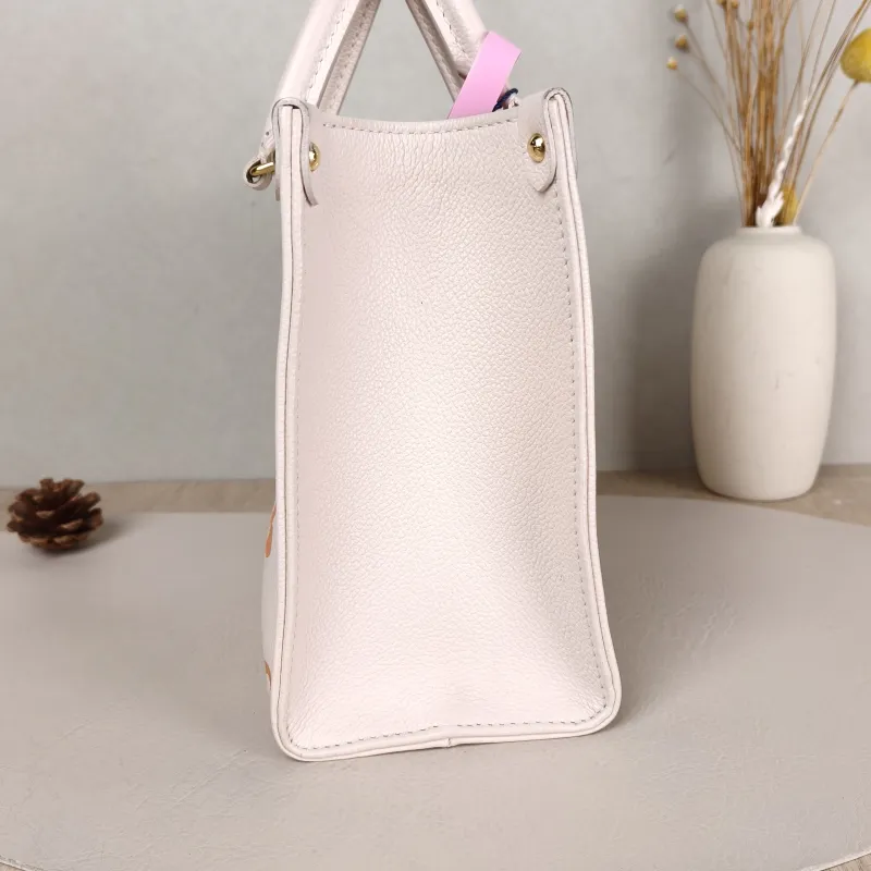 Louis Vuitton Shoulder Bag Onthego Beige Empreinte Embossed Calfskin Small 25 × 11.5 × 19 cm — detail view 3 of 9