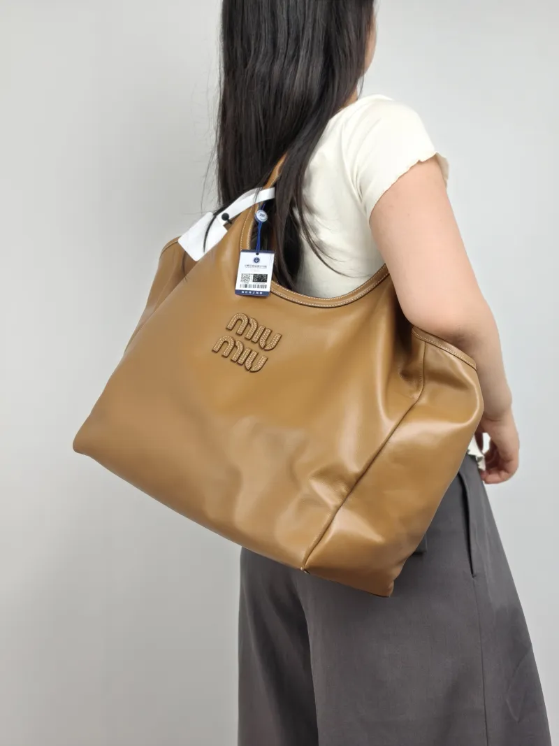 Miumiu Shoulder Bag IVY Tote Shopping Tote CC alfskin 38 × 18 × 38 cm — on-model view 1 of 2