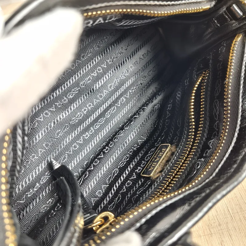 PRADA Shoulder Bag Bonnie Soft Lux Black Waxed Leather Mini 23.5 × 9 × 12 cm — detail view 10 of 14