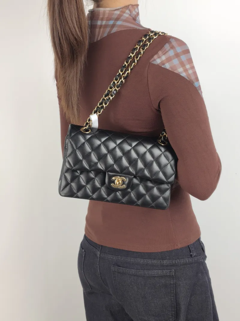 Chanel Crossbody Bag Classic Flap CF Black Lambskin Small 23 × 6 × 14.5 cm — on-model view 1 of 2