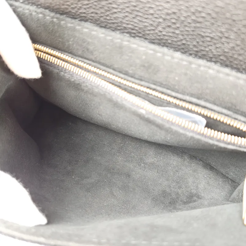 Louis Vuitton Crossbody Bag MADELEINE Black Monogram Empreinte Embossed Calfskin BB 24 × 8.5 × 17 cm — detail view 6 of 12